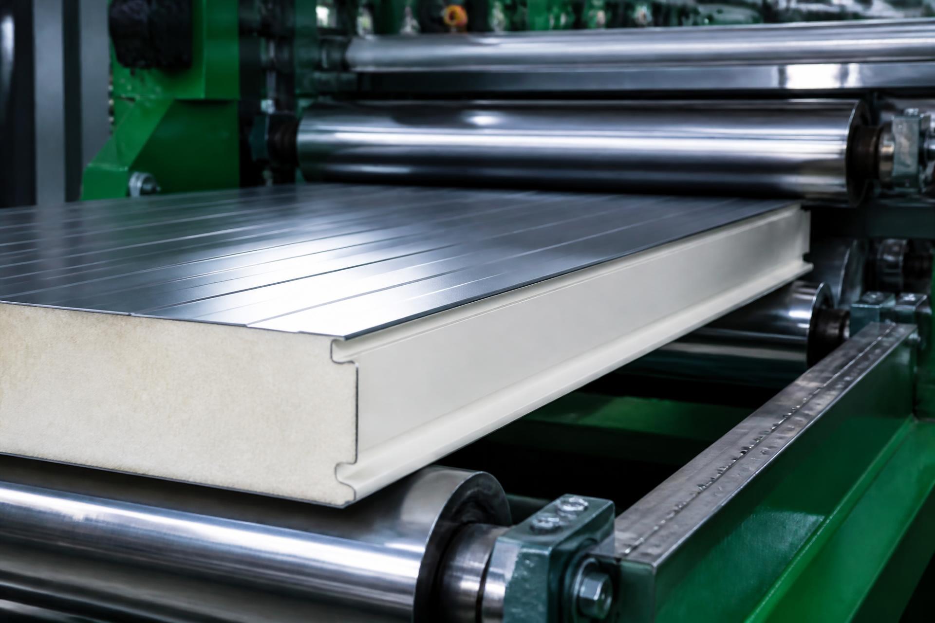 Engineers reviewing a NEVO production line general arrangement